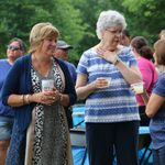 Sara & Tricia talking with Ann & Maria