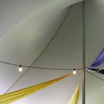 Glow of decorations reflecting on the tent