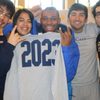 Group of beaming students with their class of 2023 t-shirts!