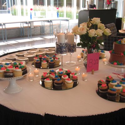 desserts and flowers on a table in the Weitz Center