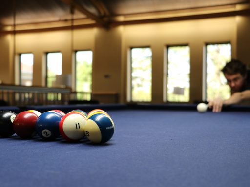 Scene of student playing pool