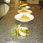 An array of salad plates, all with locally grown ingredients