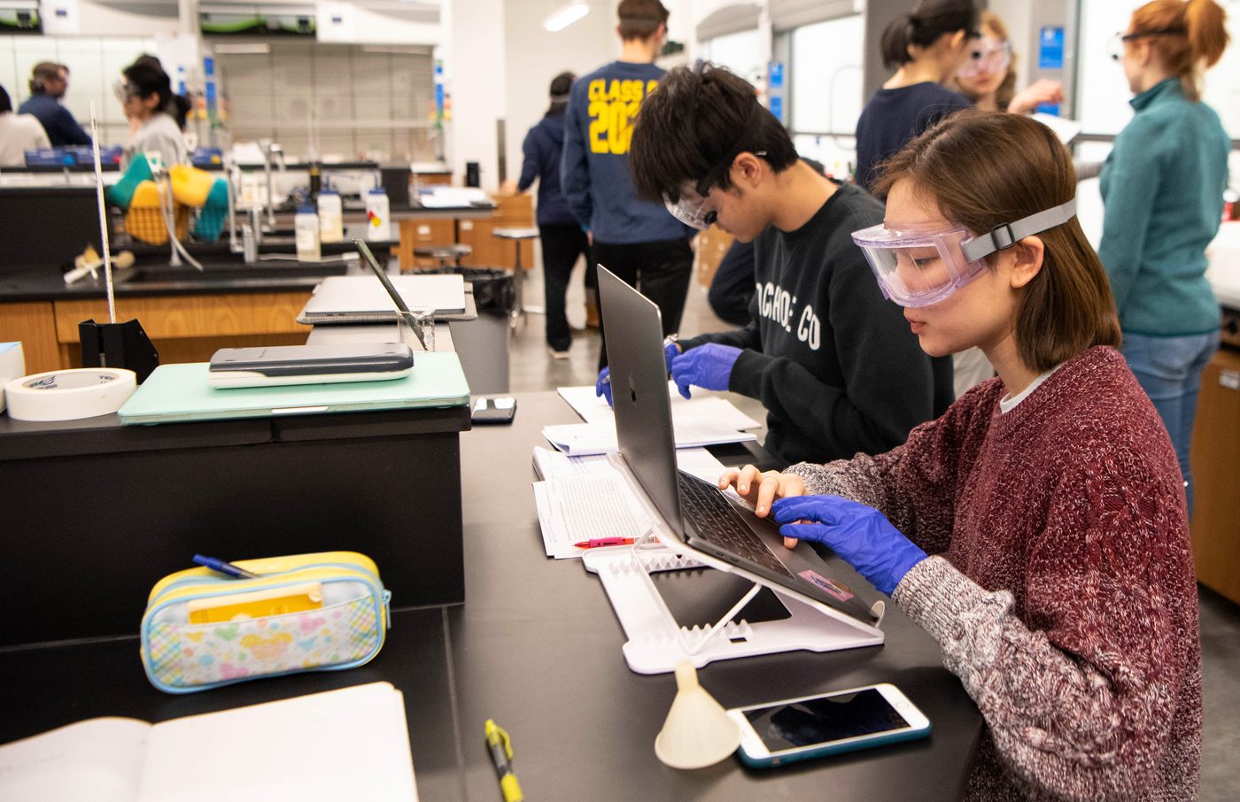 Students work in a chemistry lab