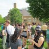 Majors & faculty visiting over treats