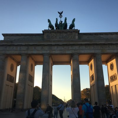 tourists photographing the Brandenburg Gate in Berlin, Germany