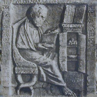 Roman relief of scholar with book chest.